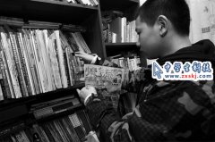 男孩發(fā)明了特殊圍布 理發(fā)時玩手機(jī)看報紙都不誤